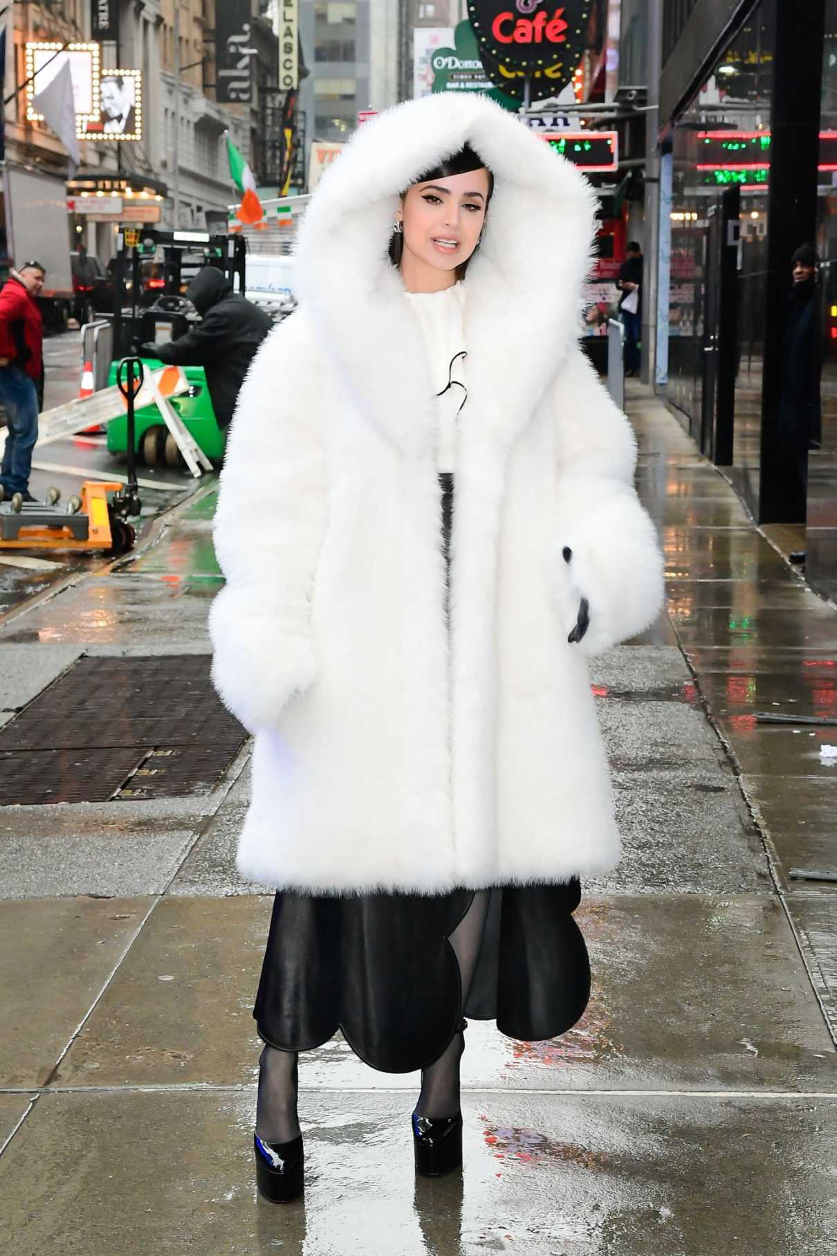 Sofia Carson in a White Fur Coat