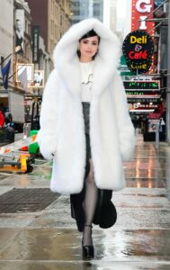 Sofia Carson in a White Fur Coat