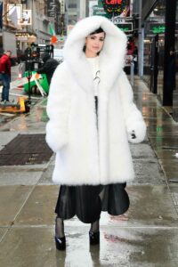 Sofia Carson in a White Fur Coat