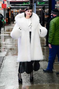 Sofia Carson in a White Fur Coat