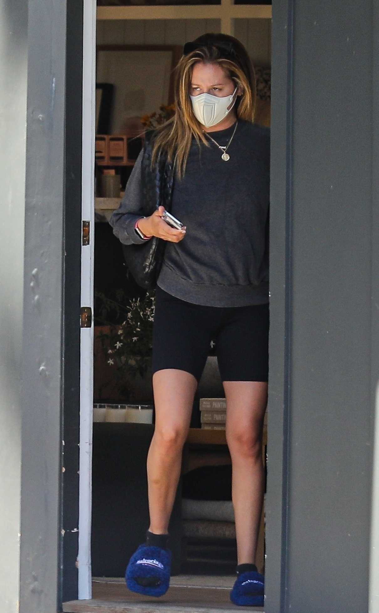Ashley Tisdale in a Black Spandex Shorts