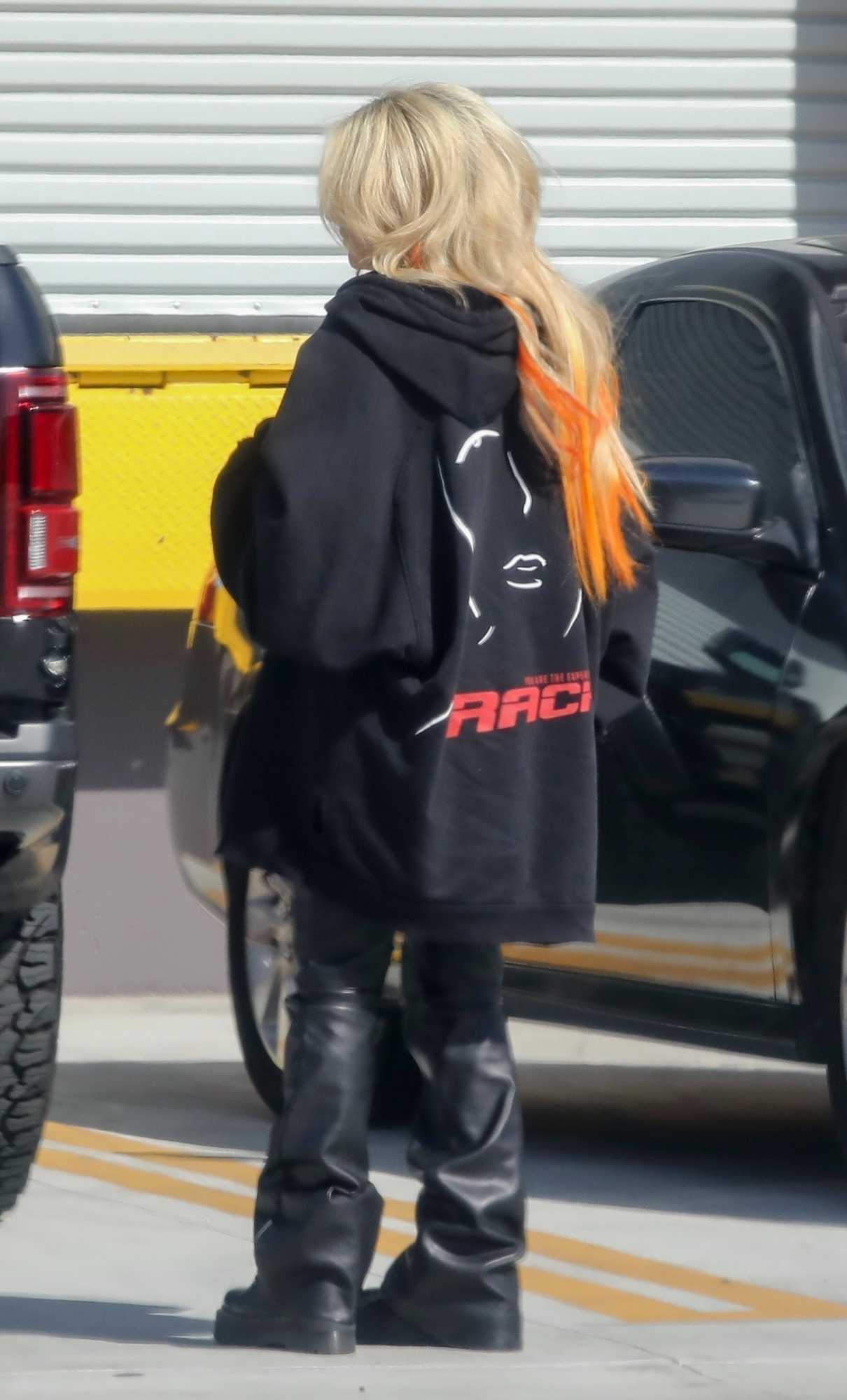 Avril Lavigne in a Black Hoodie