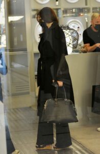 Monica Bellucci in a Black Coat