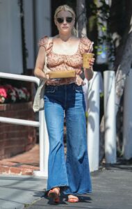 Emma Roberts in a Floral Blouse