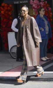 Gabrielle Union in a Brown Leather Trench Coat