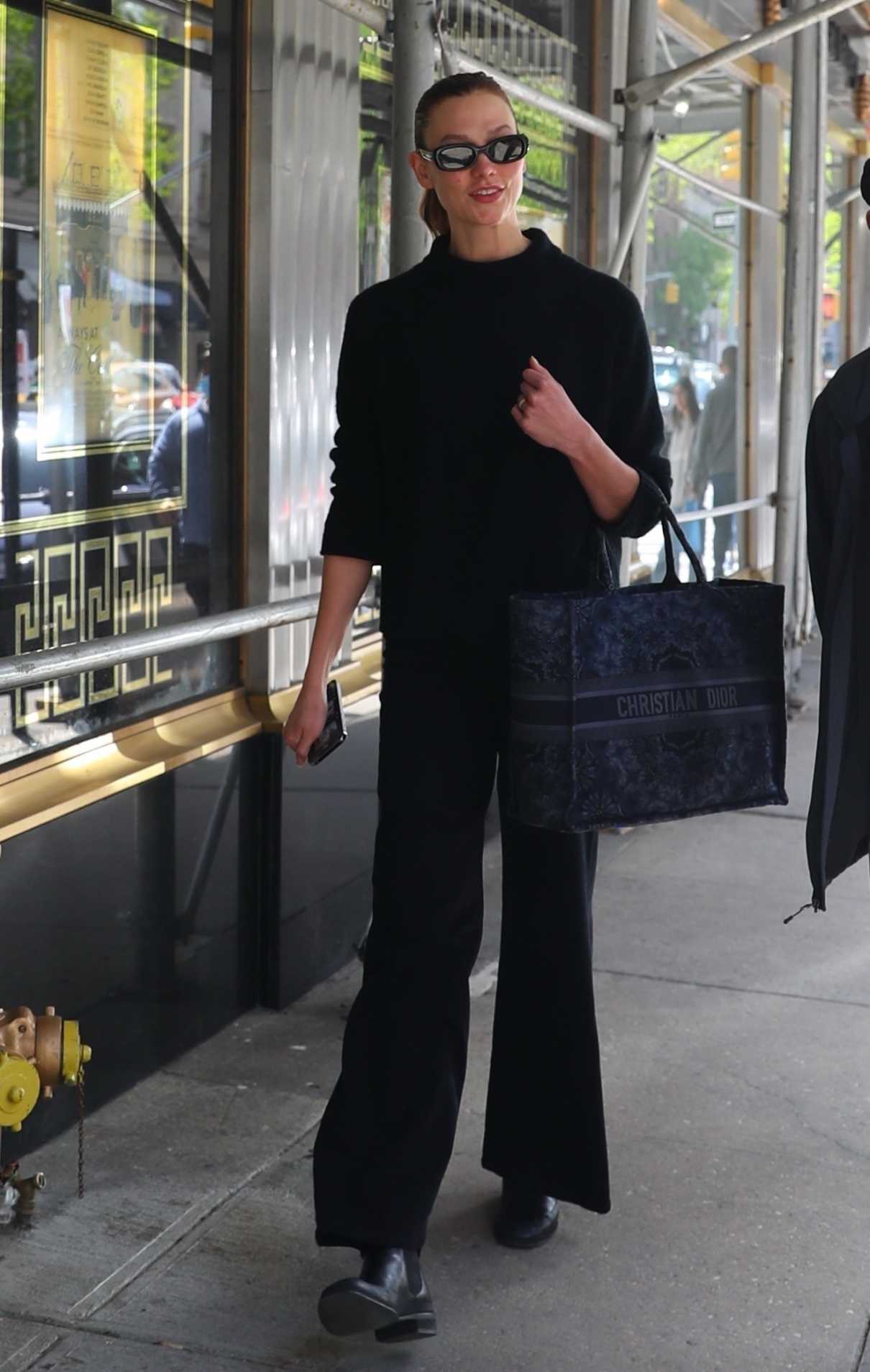 Karlie Kloss in a Black Turtleneck