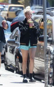 Ashley Benson in a Black Flip-Flops