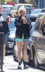 Ashley Benson in a Black Flip-Flops