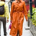 Ashley Roberts in an Orange Leather Trench Coat Leaves the Global Radio Studios in London 06/06/2022