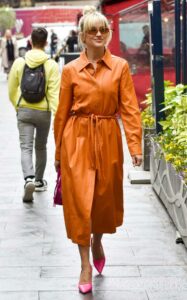 Ashley Roberts in an Orange Leather Trench Coat