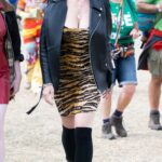 Daisy Lowe in an Animal Print Dress Attends 2022 Glastonbury Music Festival in Glastonbury 06/25/2022