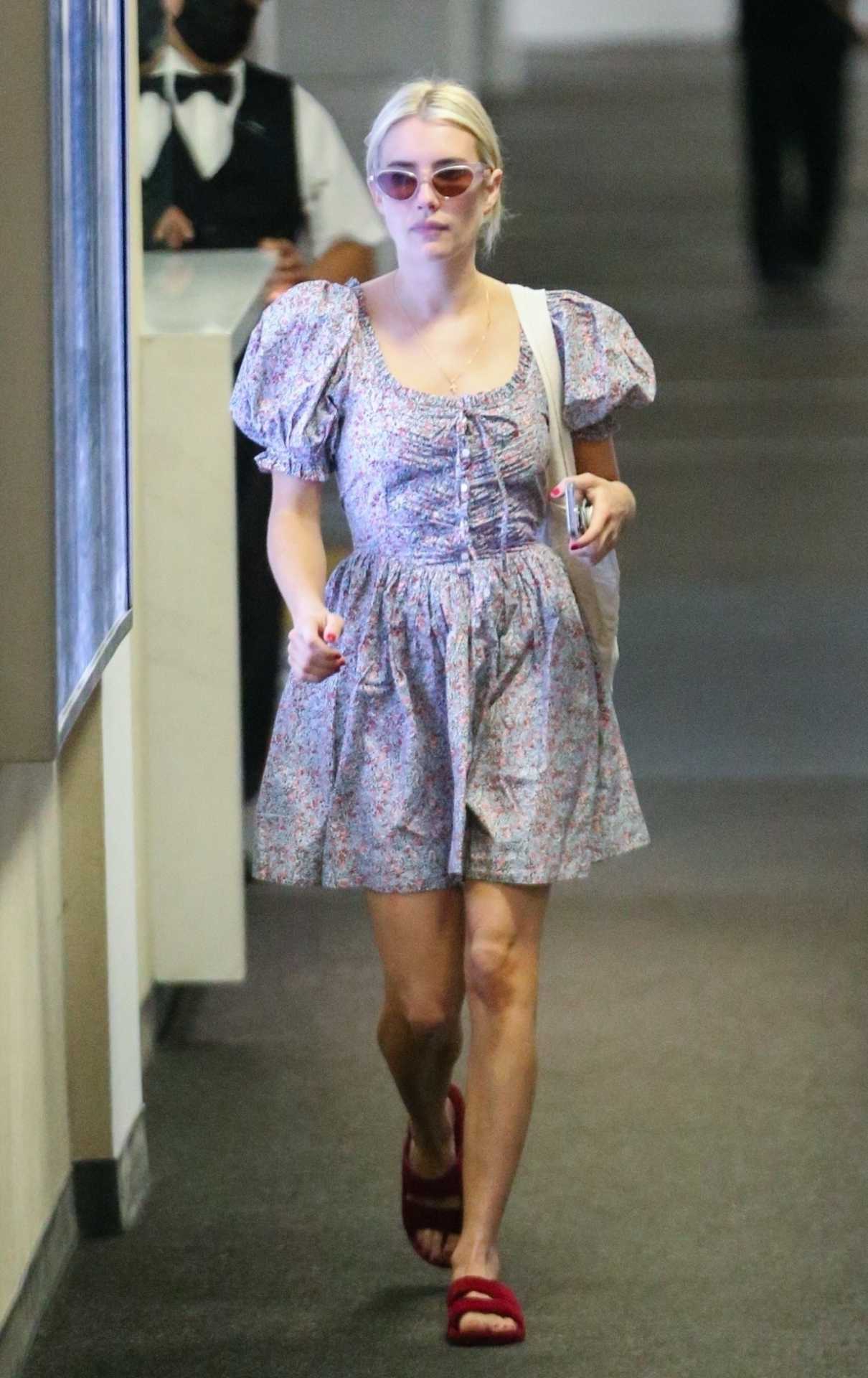 Emma Roberts in a Floral Dress