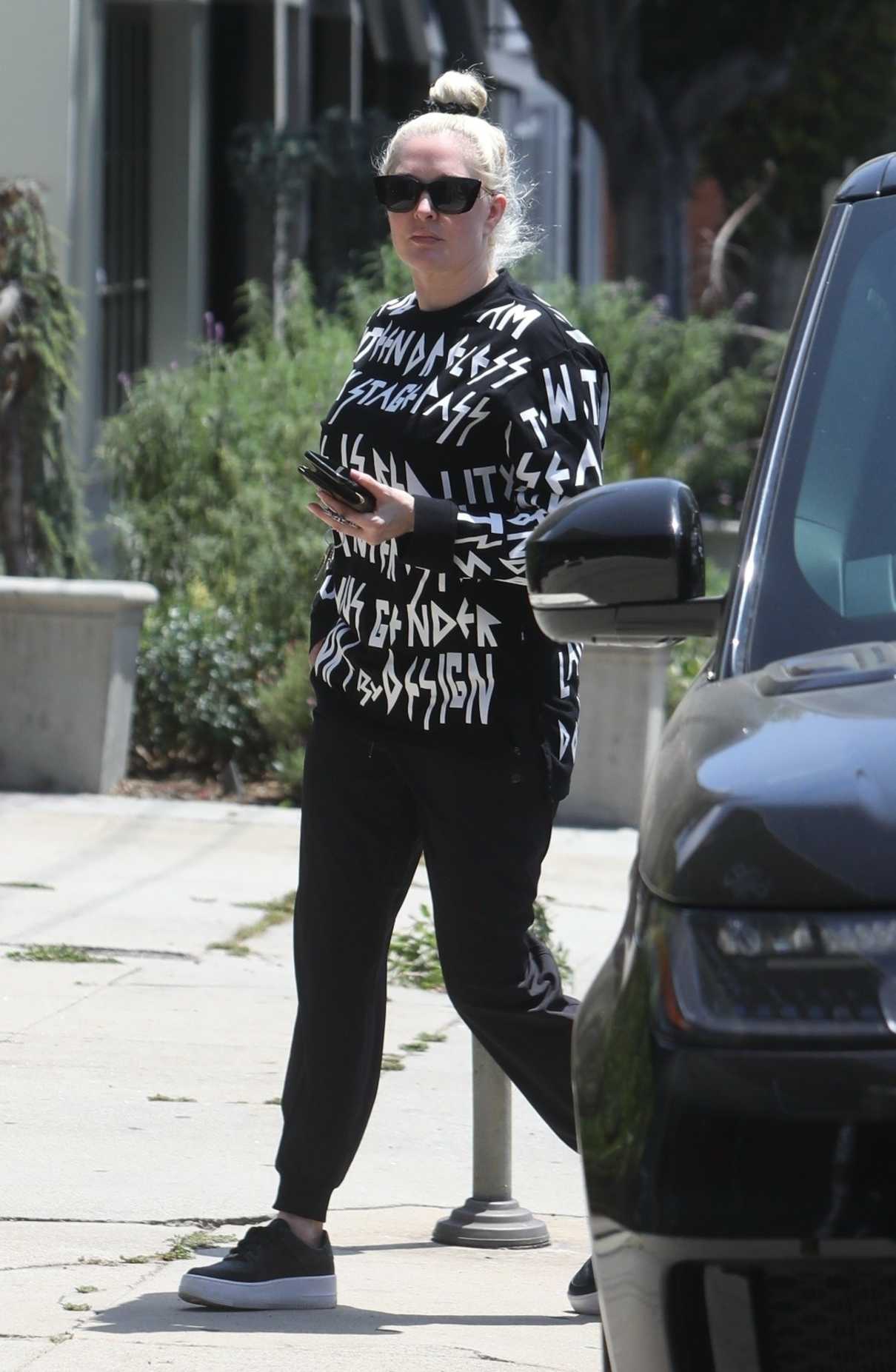 Erika Jayne in a Black Sweatpants