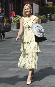 Jenni Falconer in a Yellow Dress