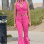 Margot Robbie in a Pink Ensemble Wearing Roller Skates on the Set of Barbie at Venice Beach in Los Angeles 06/27/2022
