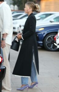 Sofia Richie in a Black Coat