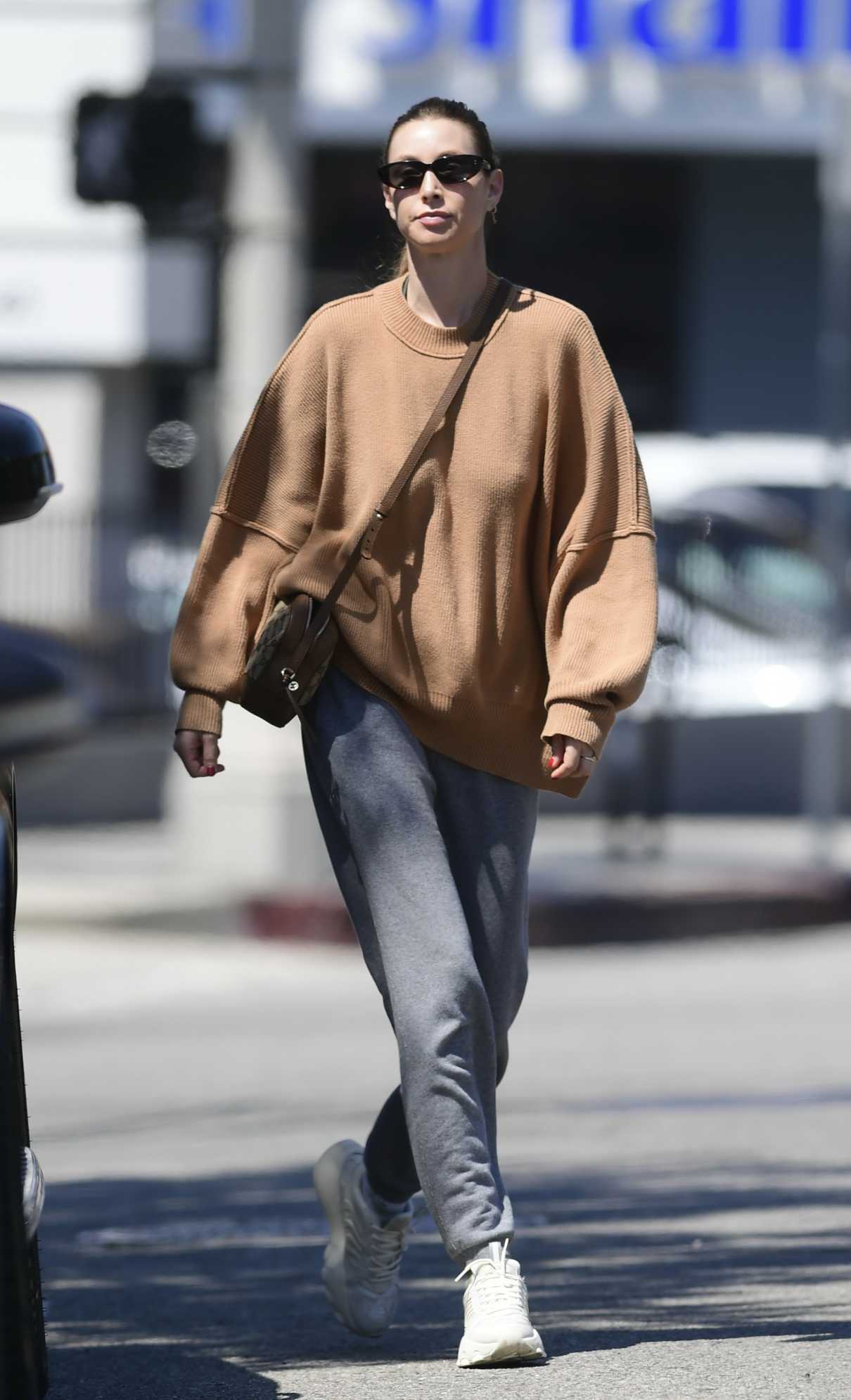 Whitney Port in a Tan Sweater