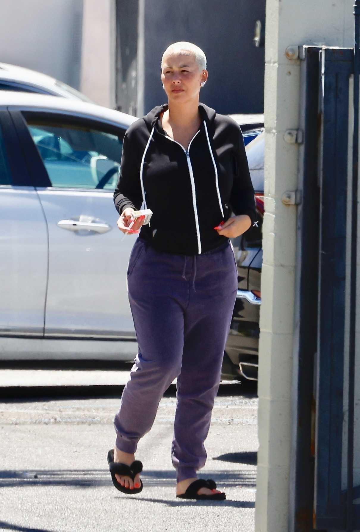 Amber Rose in a Purple Sweatpants