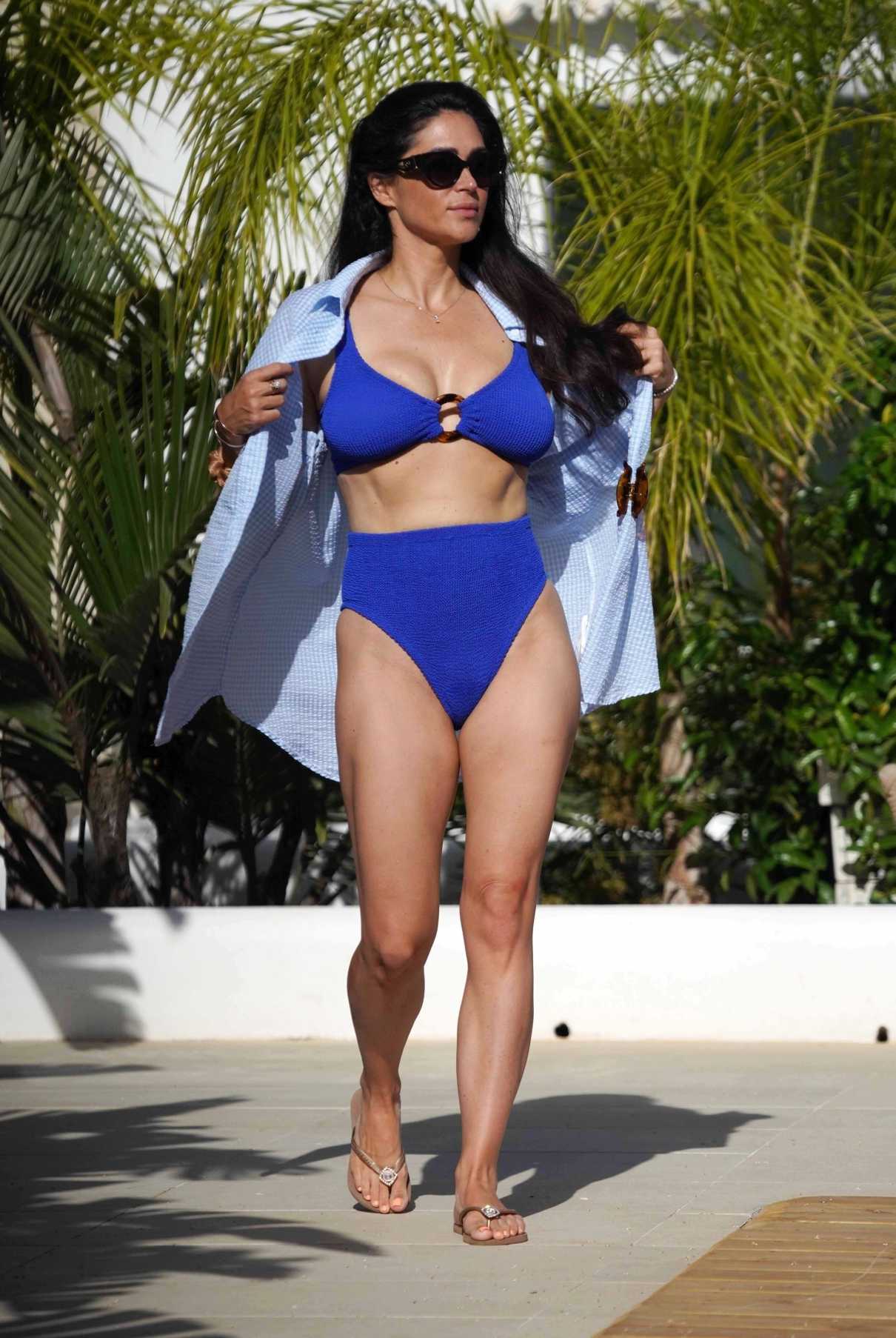 Casey Batchelor in a Blue Bikini