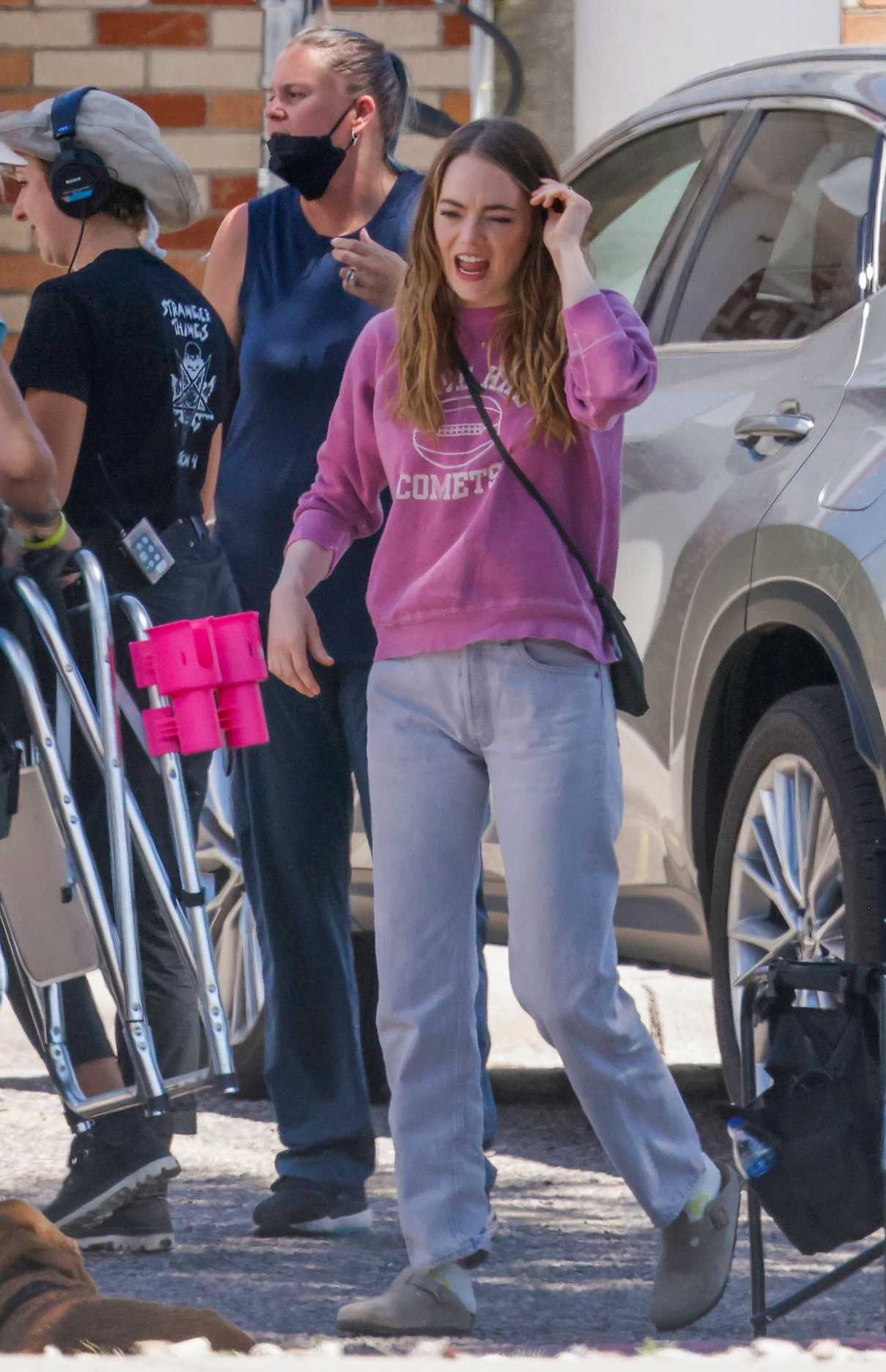Emma Stone in a Purple Sweatshirt
