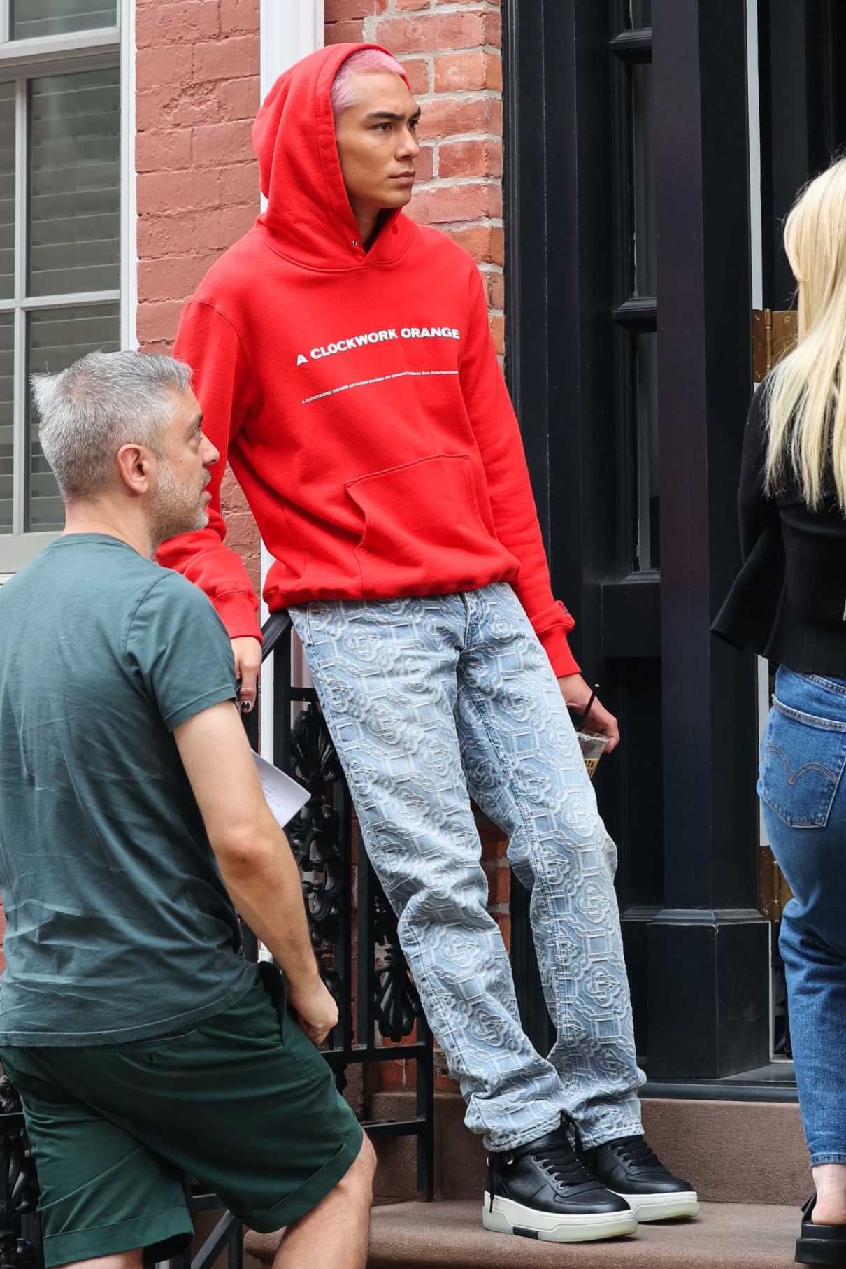 Evan Mock in a Red Hoodie