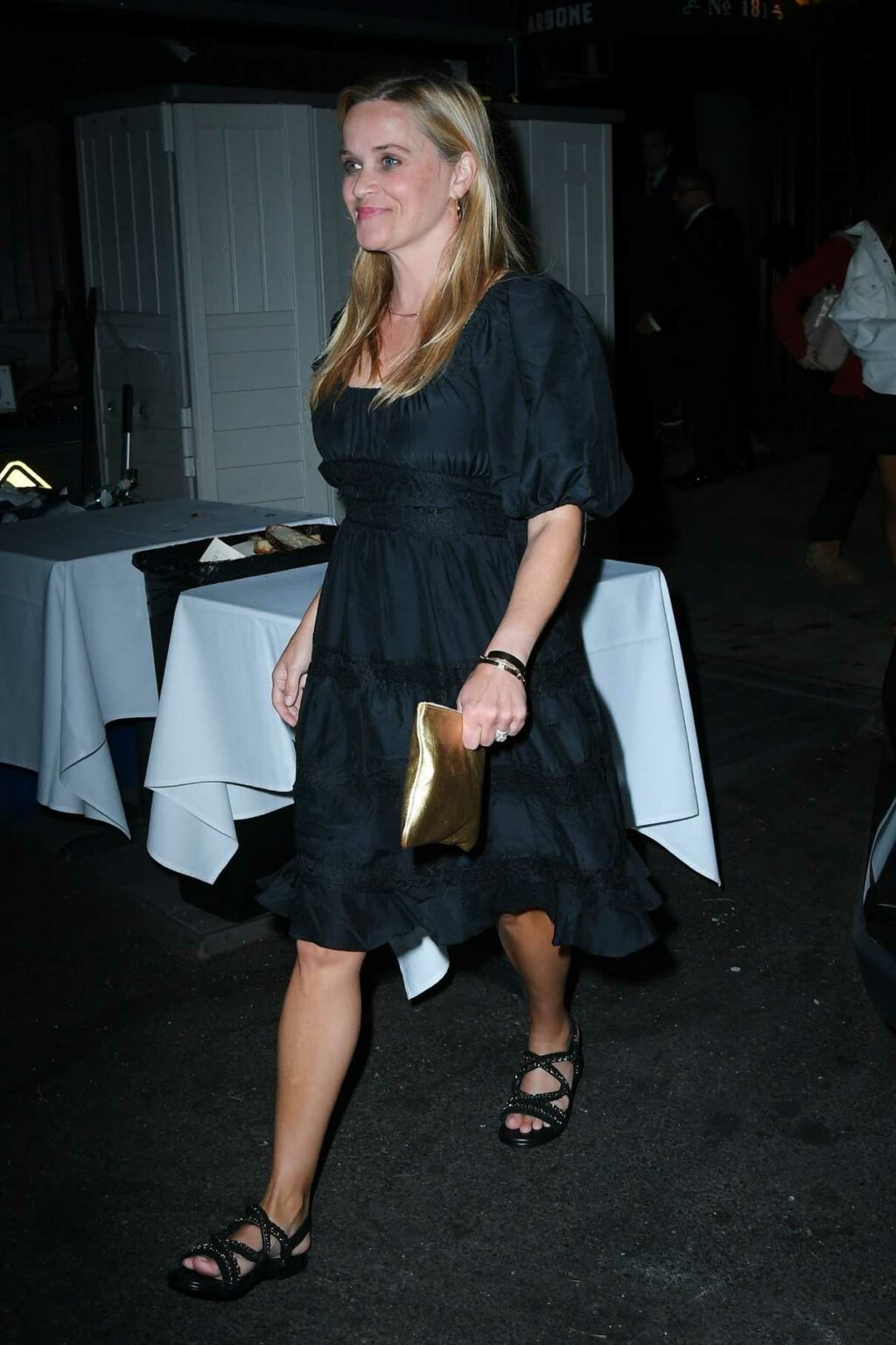 Reese Witherspoon in a Black Dress Leaves the Carbone Restaurant in New