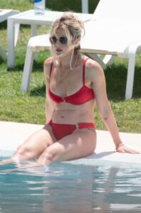 Sarah Jayne Dunn in a Red Bikini