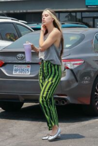 Scout Willis in a Green Striped Pants