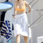 Sienna Miller in a Yellow Bikini on Holiday at Cap Antibes Eden Roc Hotel in Antibes 07/22/2022