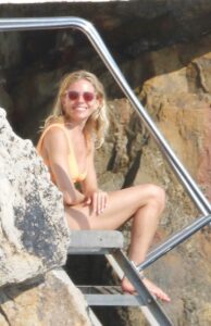 Sienna Miller in a Yellow Bikini