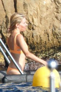 Sienna Miller in a Yellow Bikini