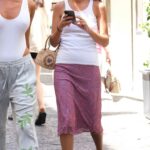 Alicia Vikander in a White Tank Top Was Seen Out with Friends in Capri 07/29/2022