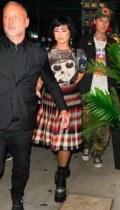 Demi Lovato in a Plaid Skirt