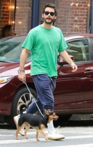 Dylan O'Brien in a Green Tee