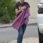 Dylan Penn in a White Converse Gym Shoes Washes Her Truck in Los Angeles 08/18/2022