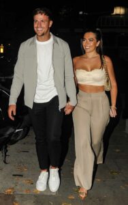 Gemma Owen in a Beige Top