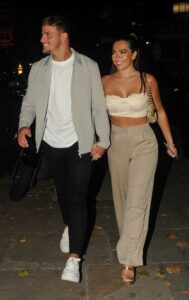 Gemma Owen in a Beige Top