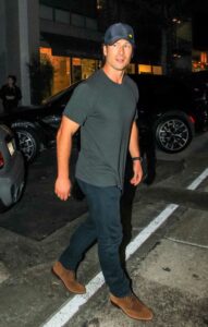 Glen Powell in a Grey Tee