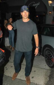 Glen Powell in a Grey Tee