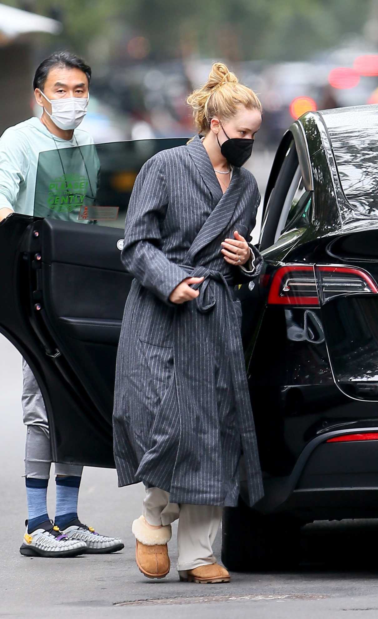 Jennifer Lawrence in a Grey Bathrobe