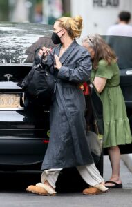 Jennifer Lawrence in a Grey Bathrobe