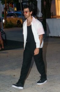 Joe Jonas in a Black Pants