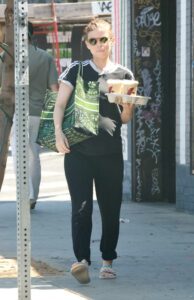 Kate Mara in a Black Adidas Tee