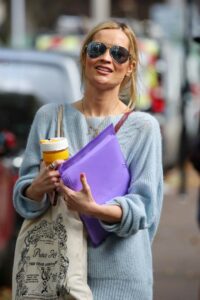 Laura Whitmore in a Blue Sweater