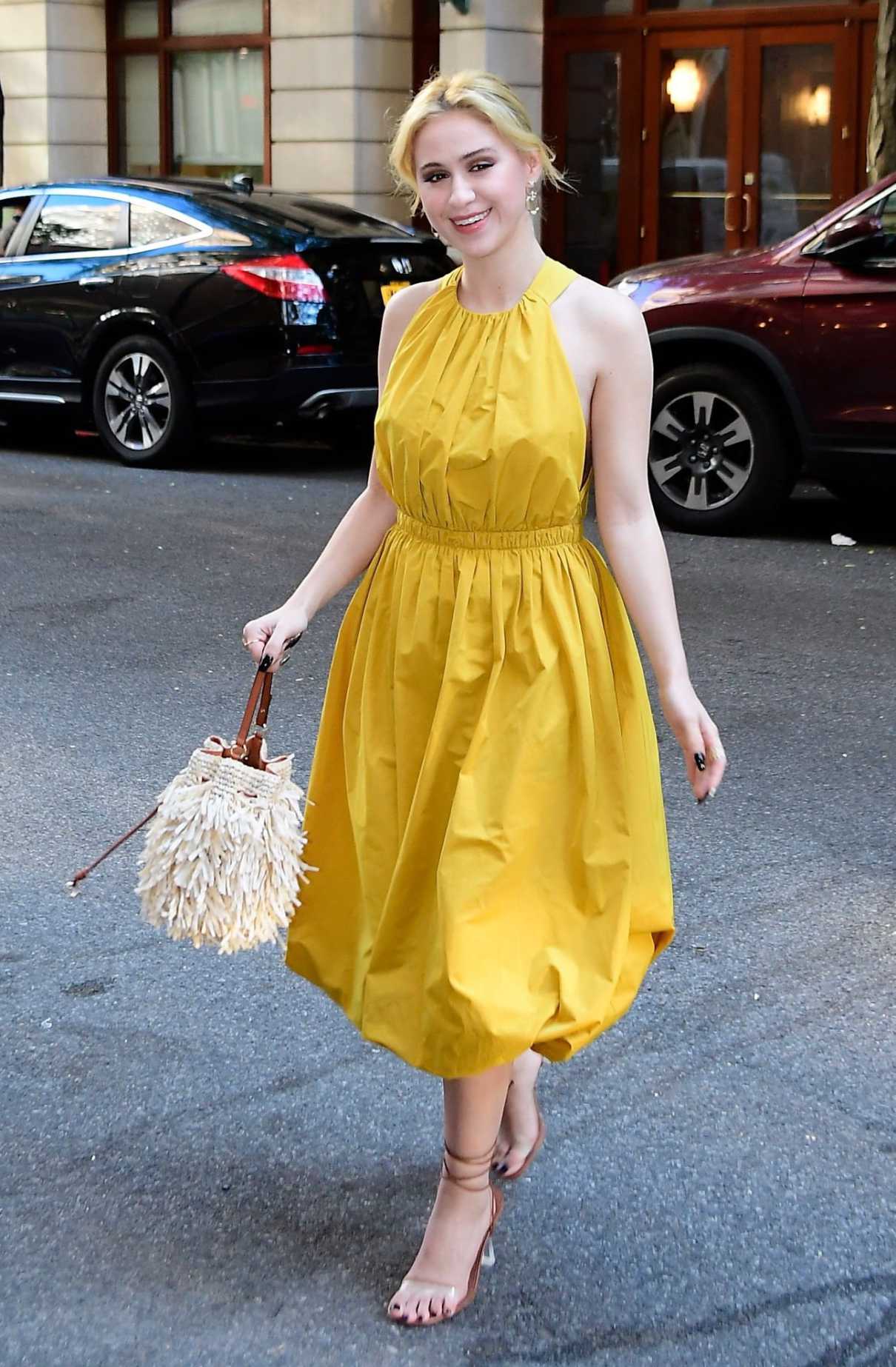 Maria Bakalova in a Yellow Dress