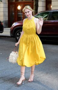 Maria Bakalova in a Yellow Dress