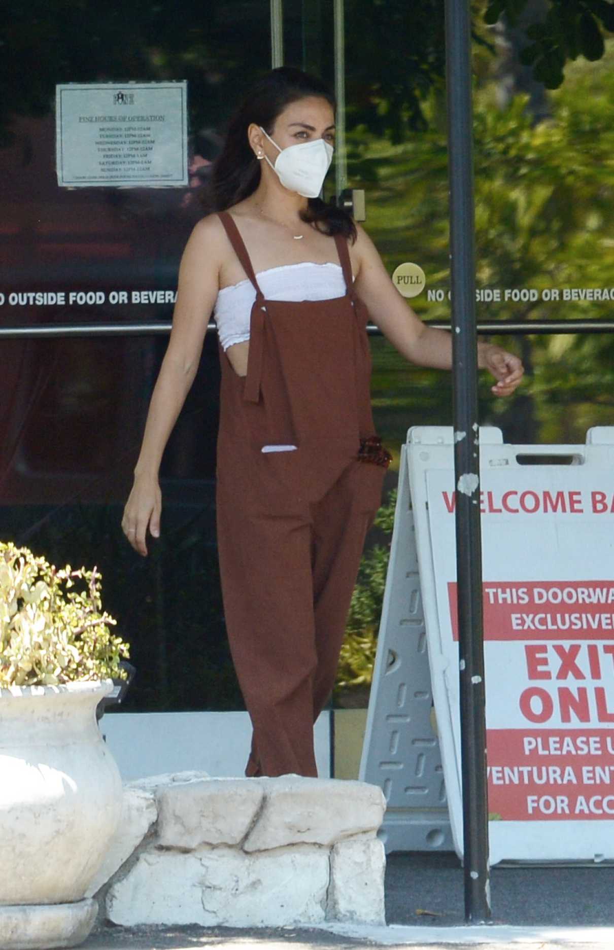 Mila Kunis in a Protective Mask