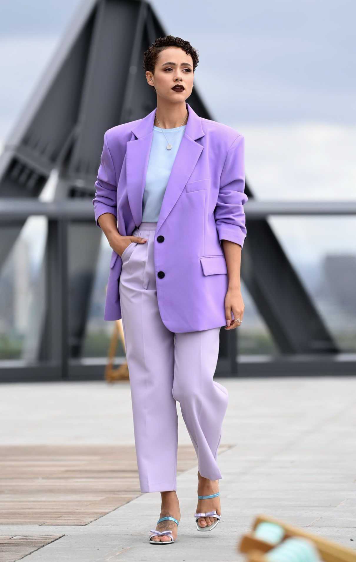 Nathalie Emmanuel in a Purple Blazer Poses During The Invitation ...