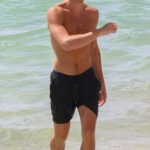 Shawn Mendes in a Black Shorts on the Beach in Miami 08/08/2022