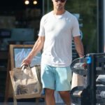 Taylor Lautner in a White Tee Leaves Erewhon Market in Calabasas 07/30/2022